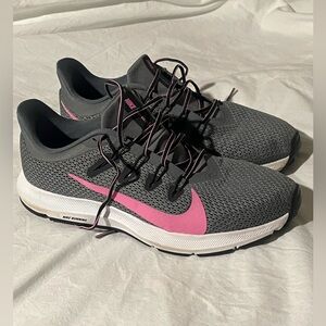 Nike Women's Gray Running Shoes with Pink Swoosh